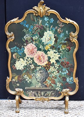 Lot 592 - A vintage firescreen with an ornate Roccocco...