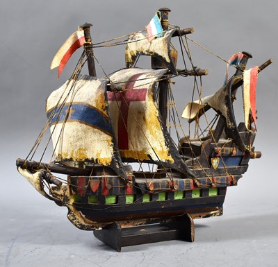 Lot 187 - A vintage handmade wooden model of a galleon...
