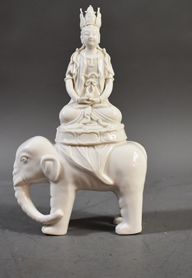 Lot 244 - A Chinese white porcelain figure, likely...