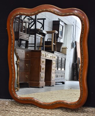 Lot 358 - An antique mahogany framed wall mirror with a...