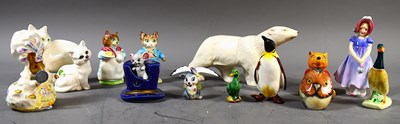 Lot 218 - A group of porcelain figures and ornaments to...