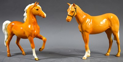 Lot 281 - Two Beswick pottery Palamino horses; both...