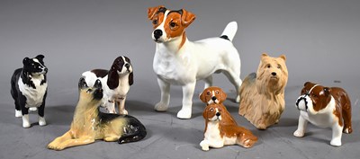 Lot 274 - A group of Beswick pottery dog figurines, to...