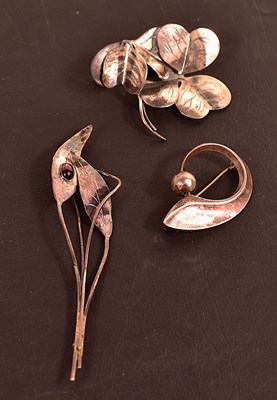 Lot 47 - Three silver Danish brooches to include an...