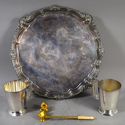 Lot 568 - A silver plated tray with decorative rim...