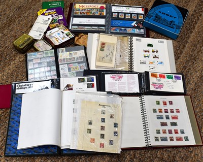 Lot 477 - A collection of stamps to include an album of...