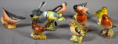 Lot 265 - Ten Beswick pottery bird figurines, to include...