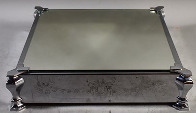 Lot 178 - A 1950s chrome and glass topped vintage...