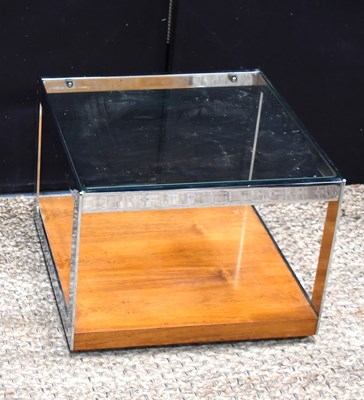Lot 634 - A Mid-Century chrome and teak side table,...