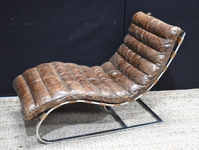 Lot 636 - A Mason brown leather recliner from Flamant,...