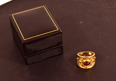 Lot 123 - An 18ct gold Byzantine style ruby and diamond...