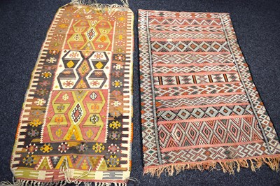 Lot 594 - Two Turkish hand woven wool kilim rugs, the...
