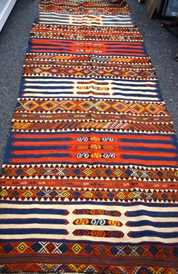 Lot 595 - A Middle Eastern wool kilim runner, with...