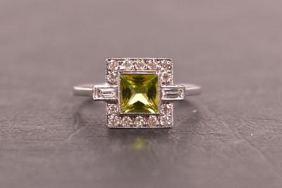 Lot 111 - A platinum, diamond and green tourmaline ring,...
