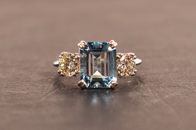 Lot 127 - A platinum, diamond and aquamarine ring, the...