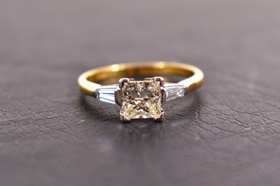Lot 128 - An 18ct gold and diamond ring, the princess...