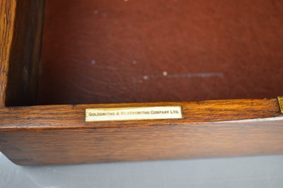 Lot 195 - An antique oak cutlery box by Goldsmiths &...