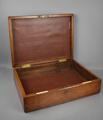 Lot 195 - An antique oak cutlery box by Goldsmiths &...