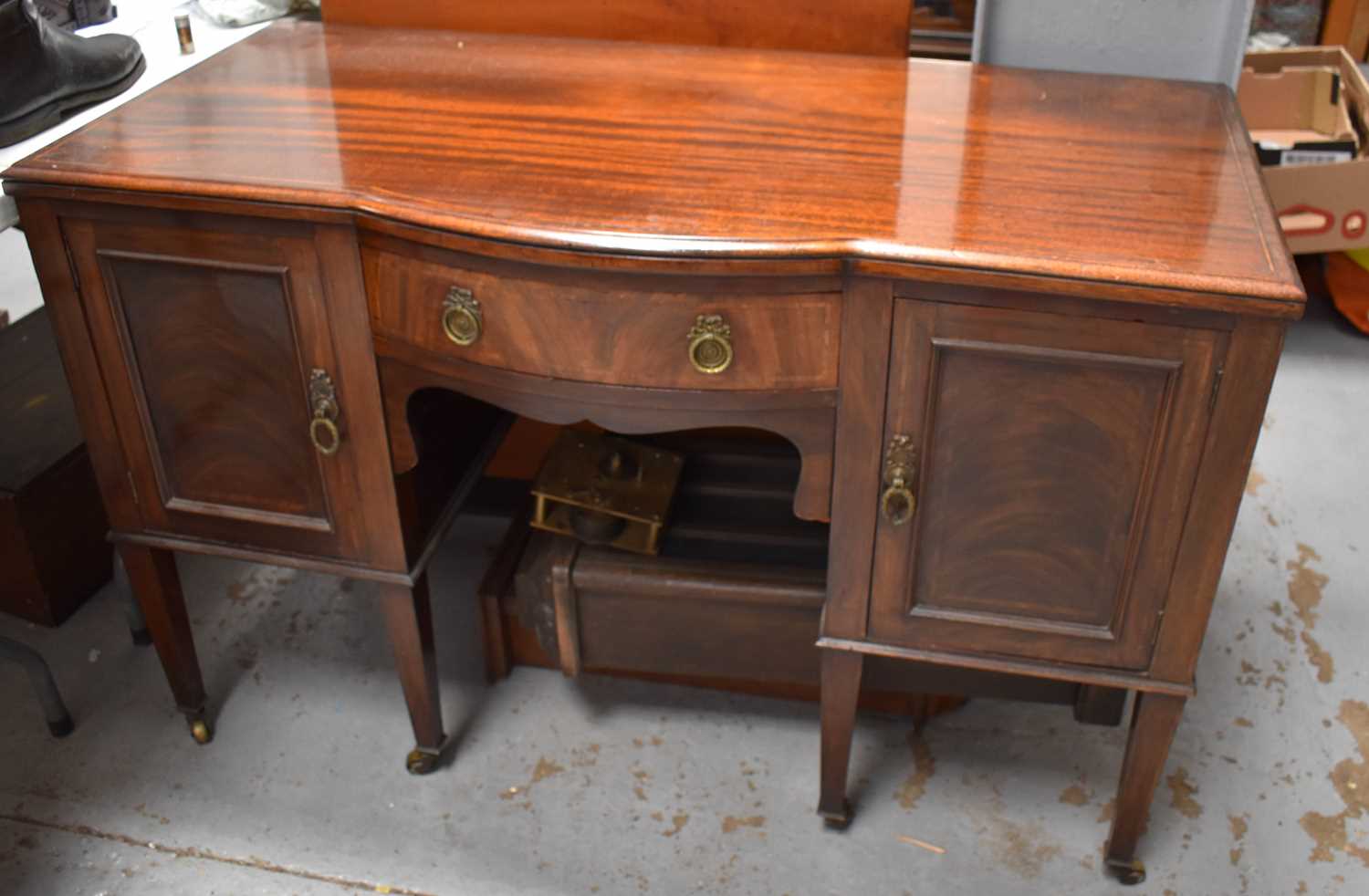 Lot 456 - An early 20th century sideboard, with bow...